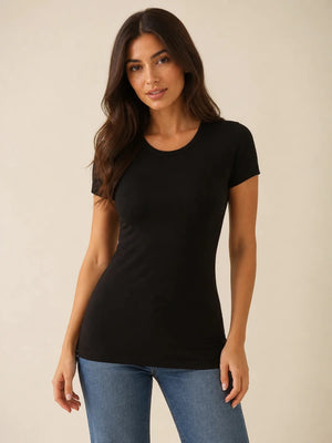 Black crew-neck short-sleeve top worn untucked with blue jeans, front view