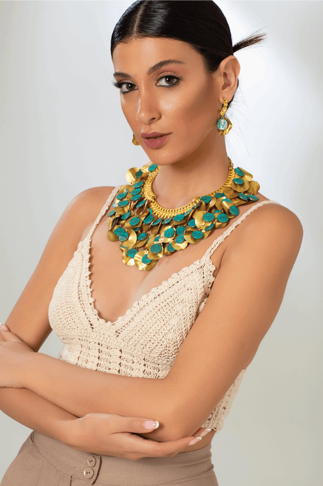 18 karat gold plated brass necklace, adorned with gold leaf and turquoise colored antiqued coins - ELLY