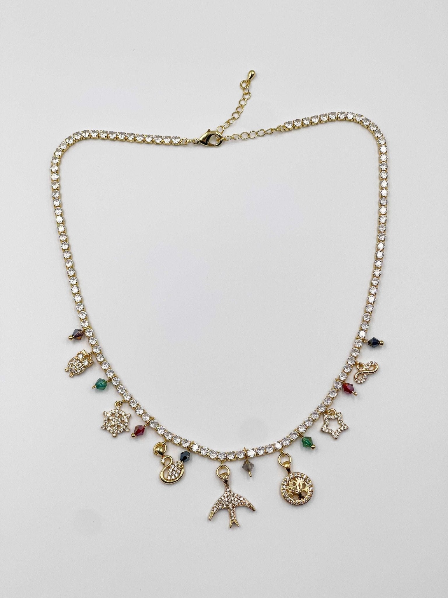 18-karat gold plated necklace adorned with sparkling crystal and zircon ornaments, as well as colored crystal stones - ELLY